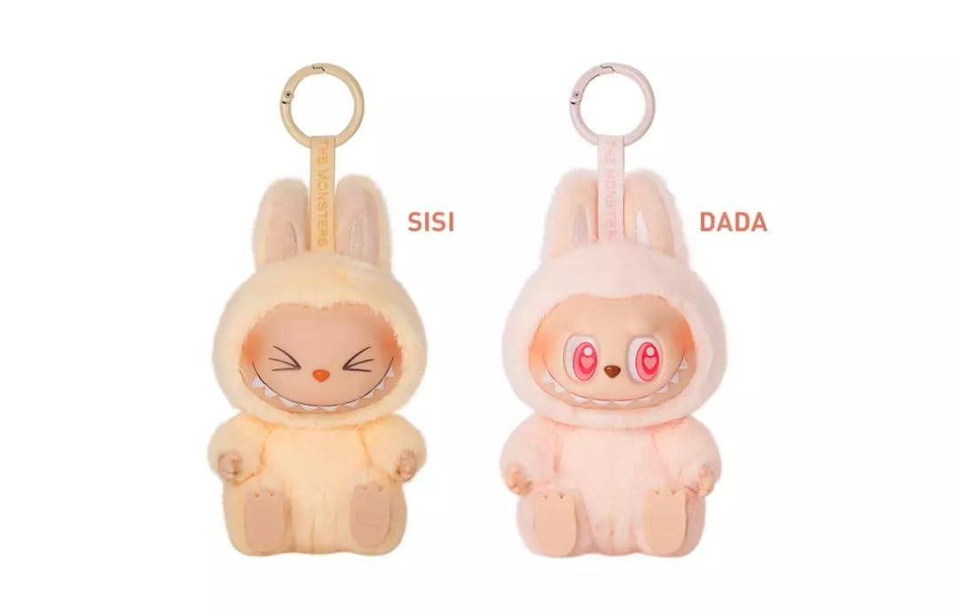 Two plush keychains, one labeled 'SISI' and the other 'DADA', on a white background.