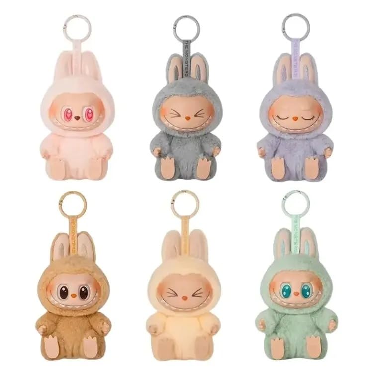 Set of six colorful plush keychains with rabbit designs on a white background
